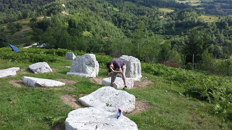 Photographing the stećci tombstones at Grčko groblje in the village of Hrta